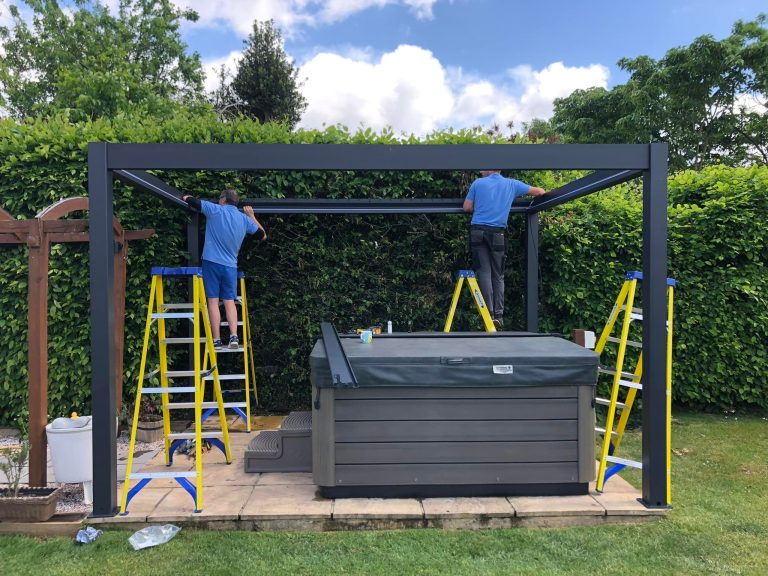 Surrey Pools and Spa construct a pergola over a hot tub