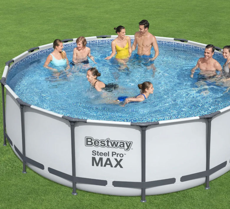 A big family play in the Bestway-12′-by-48″-Steel-Frame-Pool-Set-complete-with-pump,-debris-cover-and-ladder.