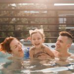 Family have fun in a hot tubs in the summer hoildays in Surrey