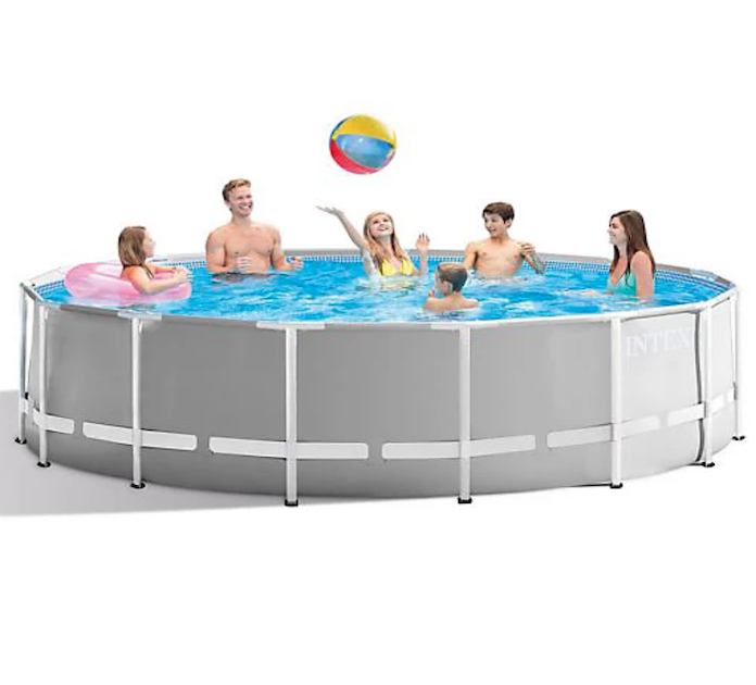 A family swim and play in the Intex-15'-by-48'-Steel-Frame-Pool-with-circulation-pump